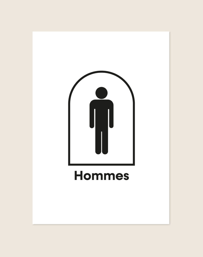Minimalistische zwart-witte poster met een zwart herenpictogram in een boog en het Franse woord Hommes, sfeervol opgehangen aan een neutrale muur in een moderne toiletruimte.