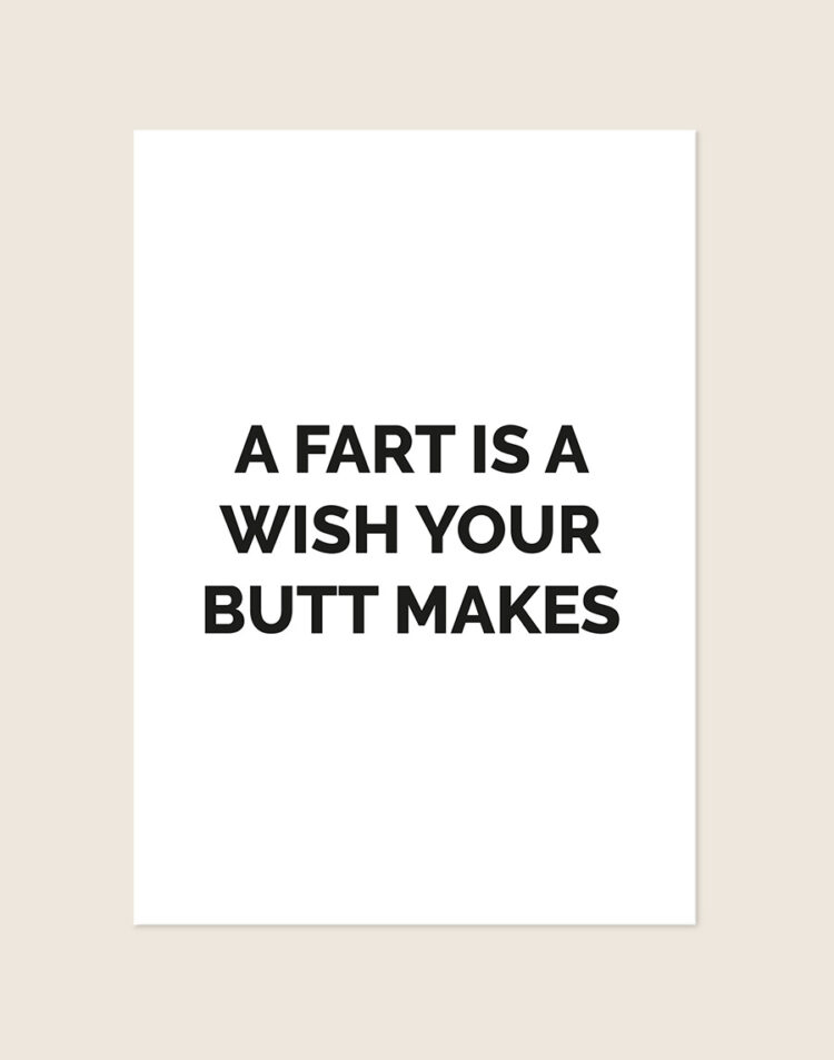 Humoristische WC Poster Wish met de Engelse quote A fart is a wish your butt makes in zwarte blokletters op een helderwitte achtergrond, sfeervol opgehangen in een ruimte.