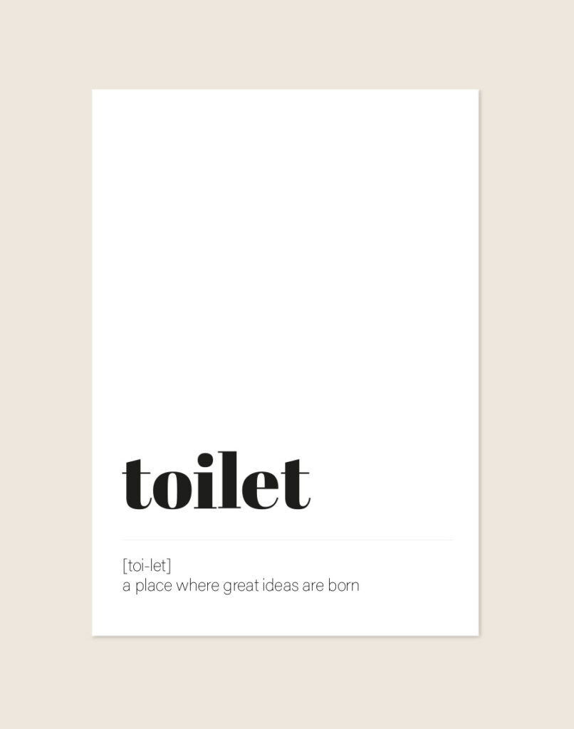 Humoristische WC Poster Toilet met de Engelse woordenboekdefinitie "a place where great ideas are born" op een helderwitte achtergrond, sfeervol opgehangen in een ruimte.
